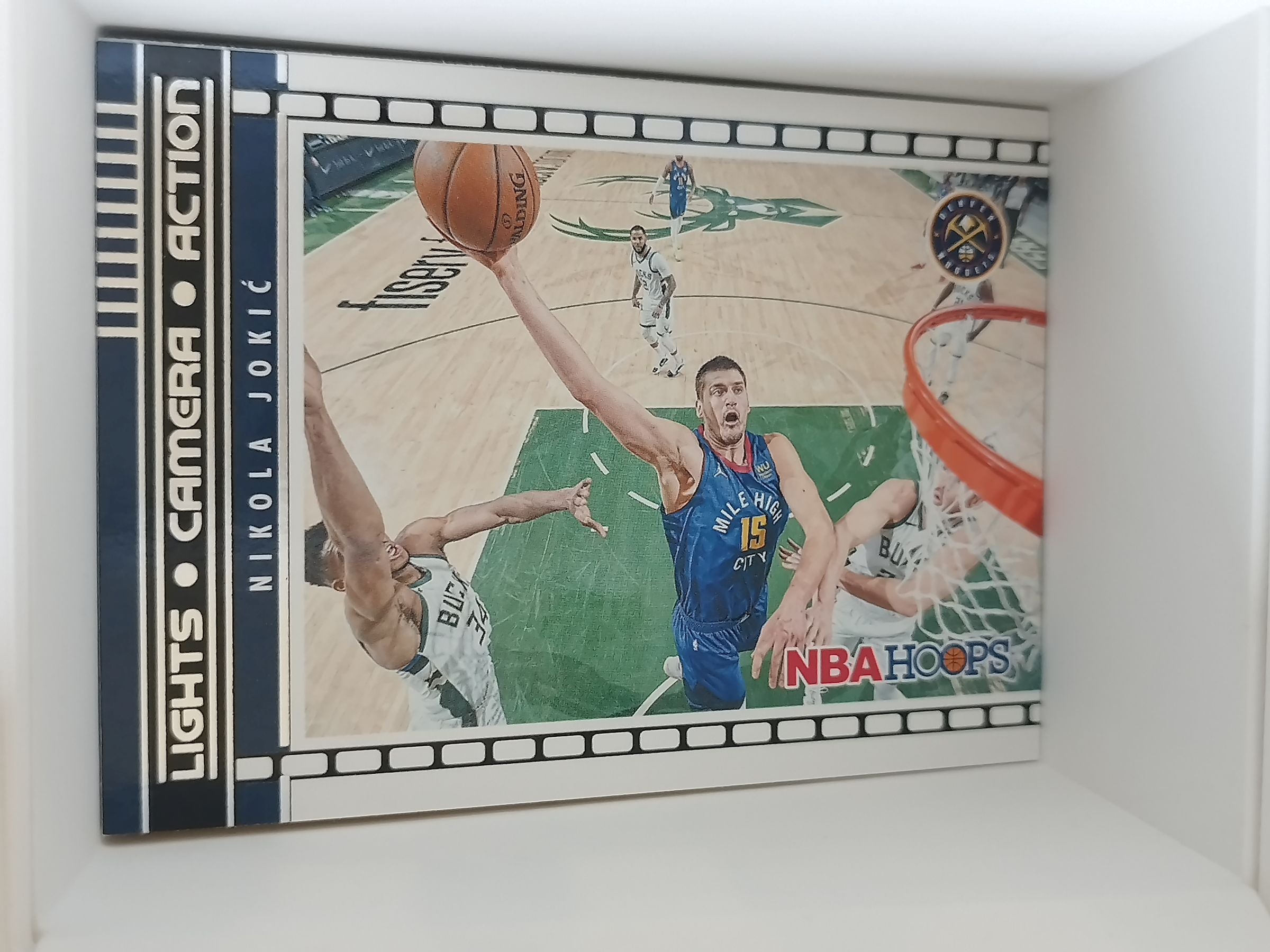 2021-22 Panini NBA Hoops · Lights Camera Action #13 · Nikola Jokic